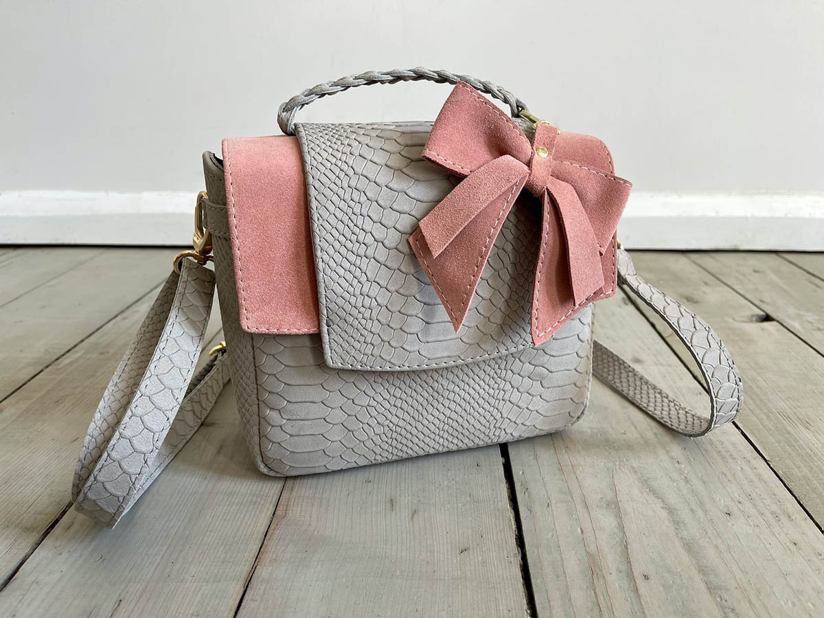 Why choose luxury leather handbags RedDamson